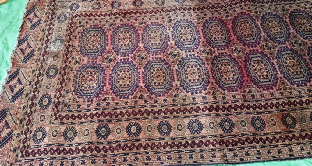 An oriental rug cleaned in a furnished room